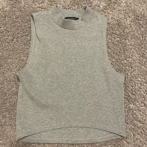 cropped mock neck sleeveless top